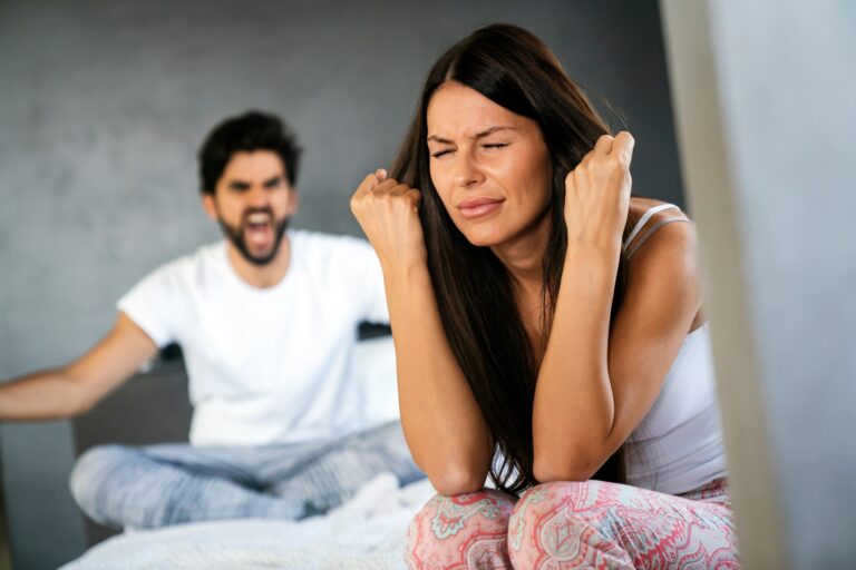 Frustrated couple arguing and having marriage problems. Domestic violence