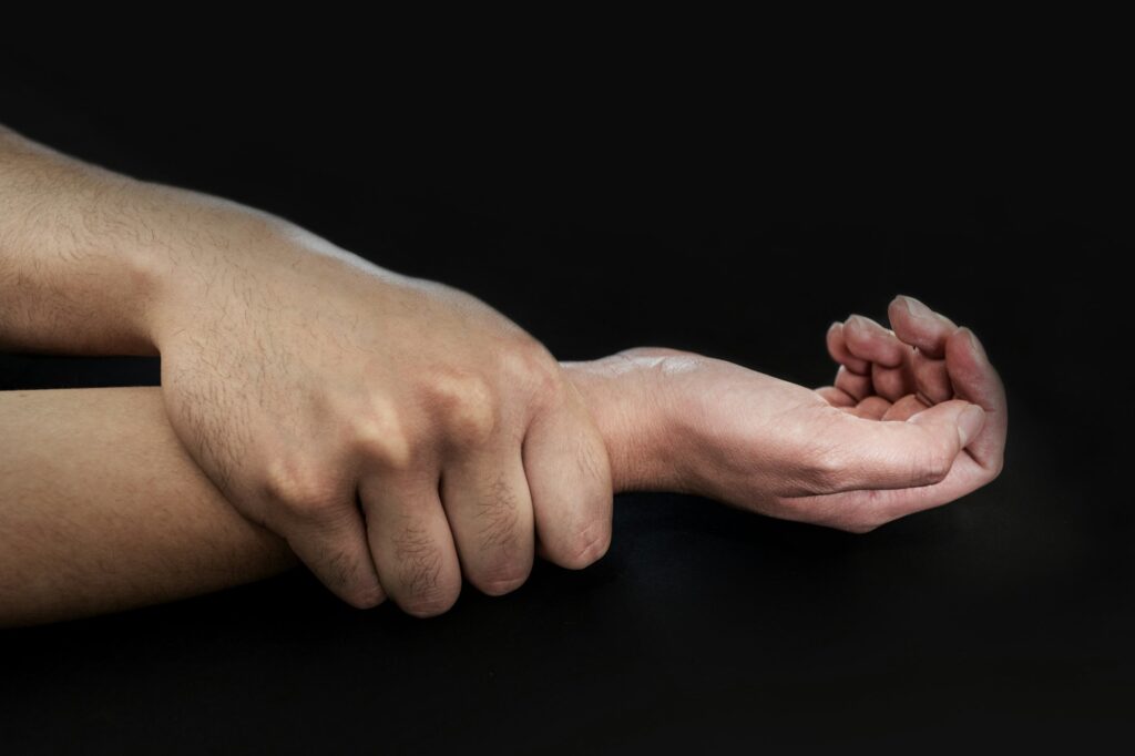 Shot of hands, male torturing a female